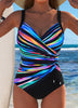 Women's FJØRNA printed tummy control one-piece swimsuit with a flattering design, ideal for stylish swimming and beachwear.