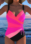 Women's FJØRNA tummy control one-piece printed swimsuit, stylish swimwear with flattering fit and vibrant print design.