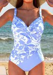 Women's FJØRNA tummy control printed one-piece swimsuit with a stylish design and supportive fit, perfect for beach or pool.