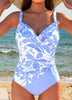Women's FJØRNA tummy control printed one-piece swimsuit with a stylish design and supportive fit, perfect for beach or pool.