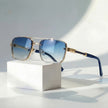 Women's retro aviator sunglasses with gold titanium frame and gradient lenses, stylish and lightweight FJØRNA sunglasses.