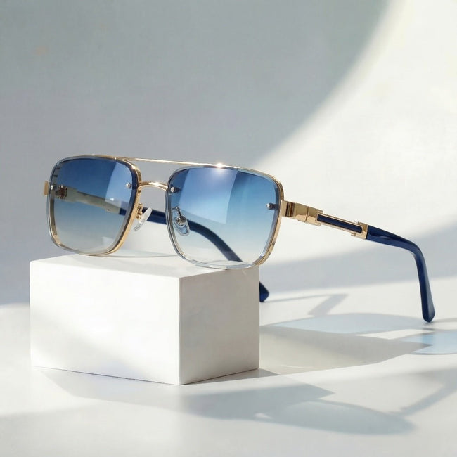 Women's retro aviator sunglasses with gold titanium frame and gradient lenses, stylish and lightweight FJØRNA sunglasses.