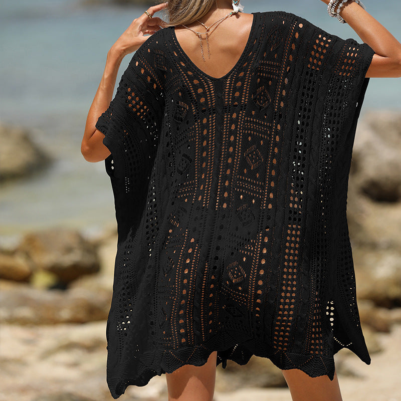 FJØRNA women's short sleeve hollow-out cover-up mini dress with stylish cut-out details on lightweight fabric.