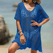 Women's FJØRNA short sleeve hollow-out cover-up mini dress, lightweight and stylish for beach or poolside wear.