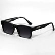 Women's square acetate sunglasses with gradient lenses and UV400 protection by FJØRNA, showing the stylish frame and tinted lenses.