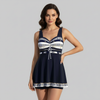 Women's FJØRNA nautical print swim dress with fitted bodice and skirted hem for a stylish, swimwear look.