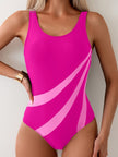 Women's FJØRNA scoop neck swimsuit with contrast side panel print, showcasing a stylish and comfortable one-piece design.