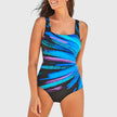 Women's FJØRNA square neck swimsuit with a vibrant multi-pattern print, featuring a stylish and athletic design.