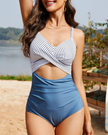 FJØRNA women's twist front cut-out swimsuit with ruched body and stylish design, perfect for swimwear fashion.