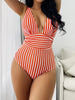 Women's FJØRNA plunge V-neck swimsuit with vertical stripe print and ruched detail, designed for stylish beach or pool wear.