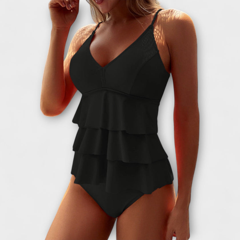 FJØRNA women's tankini set featuring a triple-tier ruffle top and high-waist briefs, perfect for summer swimwear.