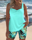 FJØRNA women's tankini swimsuit set with crossover top and matching shorts, stylish swimwear for beach or pool.