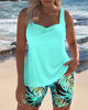 FJØRNA women's tummy control tankini with printed bottoms, featuring supportive design and vibrant floral pattern.