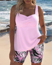 FJØRNA women's tummy control tankini with printed bottoms, featuring supportive fit and vibrant swimwear design.