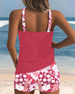 Women's two-piece tankini swimsuit with floral swim shorts by FJØRNA, featuring a tankini top and colorful floral shorts.