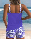 Women's two-piece tankini swimsuit with floral swim shorts, featuring a tankini top and colorful floral pattern.