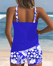 Women's two-piece tankini swimsuit with floral swim shorts by FJØRNA, shown with tankini top and matching floral shorts.