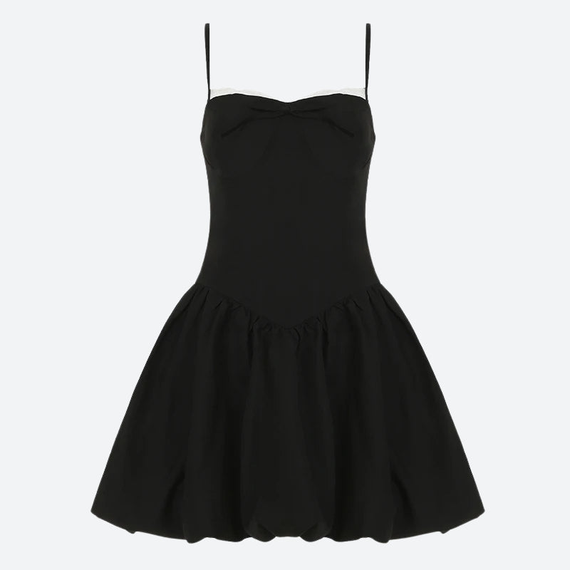 FJØRNA Y2K Bow Bubble Mini Dress featuring a playful bow detail and bubbly fabric for a trendy, youthful look.