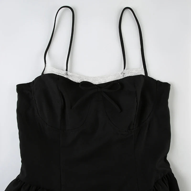 FJØRNA Y2K Bow Bubble Mini Dress featuring a playful bubble silhouette and bow detail, perfect for retro-inspired fashion.
