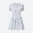 FJØRNA Y2K Chelsea Collar Mini Dress featuring a fitted silhouette, short length, and vintage-inspired design.
