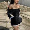 FJØRNA Y2K white corduroy off-shoulder bow mini dress, stylish and cute, shown on a model with a playful off-shoulder design.