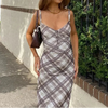 FJØRNA Y2K plaid slip midi dress for women, featuring a stylish plaid pattern and versatile day-to-night wear.