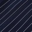 FJØRNA Y2K striped strapless mini dress featuring bold colorful vertical stripes and a fitted, stylish design.