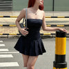 FJØRNA Y2K striped strapless mini dress with vibrant horizontal patterns and fitted silhouette, perfect for trendy casual wear.