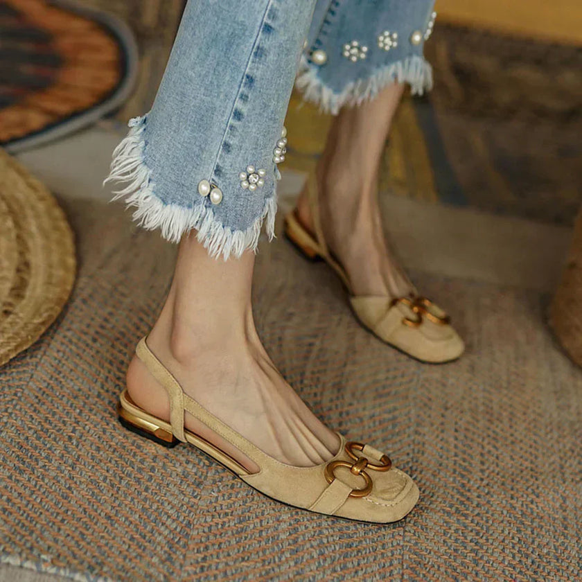 FJØRNA Cecilia™ orthopedic sandals with cushioned straps and supportive sole, featuring neutral beige color and adjustable buckle.
