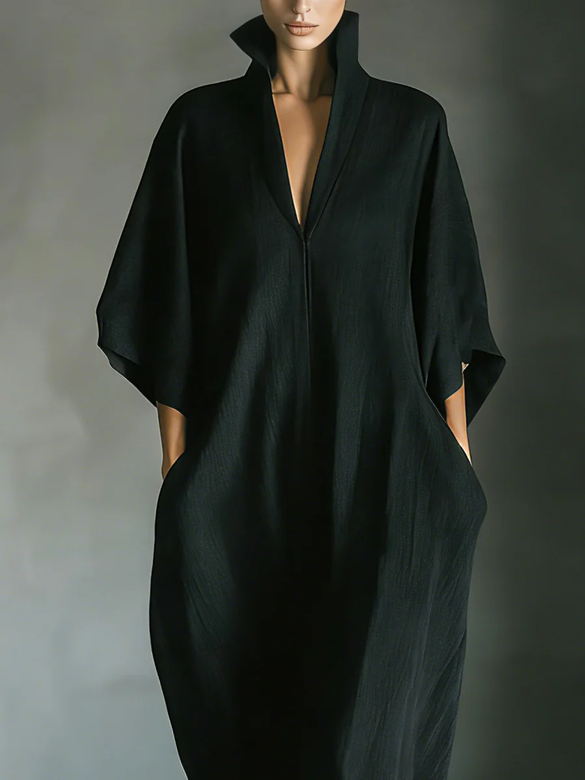FJØRNA women's summer maxi dress with V-neck and kimono sleeves, flowing lightweight fabric in a stylish design.