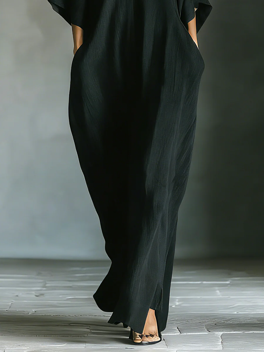 FJØRNA women's summer maxi dress with V-neck and kimono sleeves, lightweight and flowy for warm weather wear.