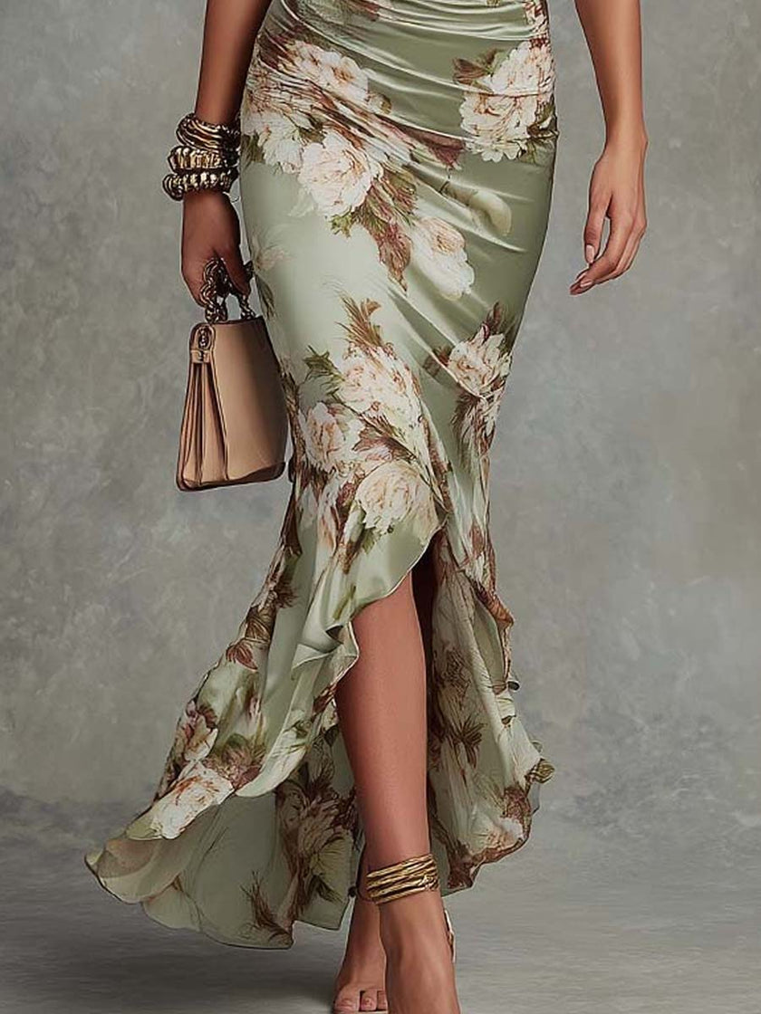 FJØRNA Kassy White Dress, a long elegant dress with flowing fabric, perfect for formal occasions or summer events.