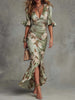 FJØRNA Kassy White Dress, a long elegant dress with flowing fabric, showcased on a model for a stylish look.