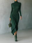 FJØRNA elegant high neck knit midi dress for women, showcasing a fitted silhouette and soft fabric in a stylish design.
