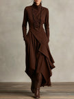 Brown FJØRNA summer maxi dress for women with high neck and long sleeves, flowing lightweight fabric, casual elegant style.