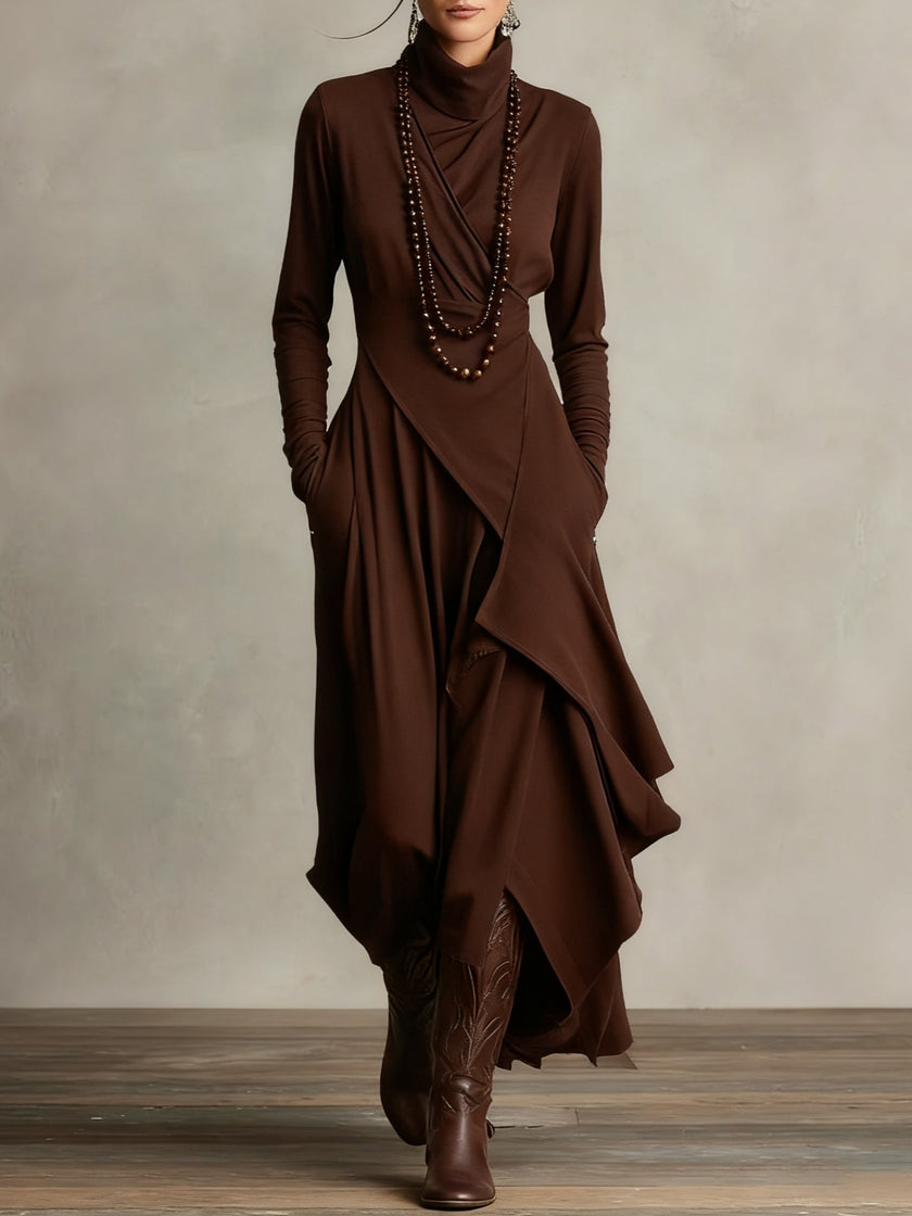 Brown FJØRNA summer maxi dress for women with high neck and long sleeves, flowing lightweight fabric, casual elegant style.