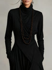 FJØRNA women's summer maxi dress with high neck and long sleeves, flowing fabric, in a vibrant floral pattern.
