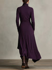 FJØRNA summer maxi dress for women with high neck and long sleeves, flowing fabric in a vibrant floral pattern.