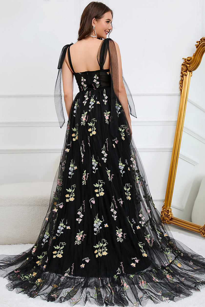 Black FJØRNA Macy tulle A-line evening dress with elegant flowy fabric and intricate detailing, perfect for formal occasions.