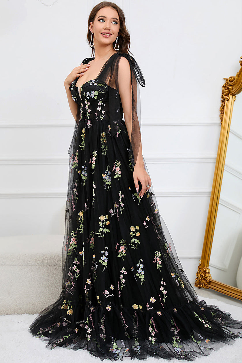 Black FJØRNA Macy trendy tulle A-line evening dress with elegant flowy fabric and fitted bodice, perfect for formal occasions.
