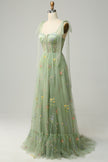 FJØRNA Macy trendy tulle A-line evening dress in green, featuring a flowing silhouette and elegant design.
