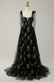 FJØRNA Macy trendy black tulle A-line evening dress with a fitted bodice and flowing skirt, perfect for formal occasions.