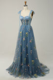 FJØRNA Macy trendy tulle A-line evening dress in grey and blue, featuring a flowing silhouette and elegant design.