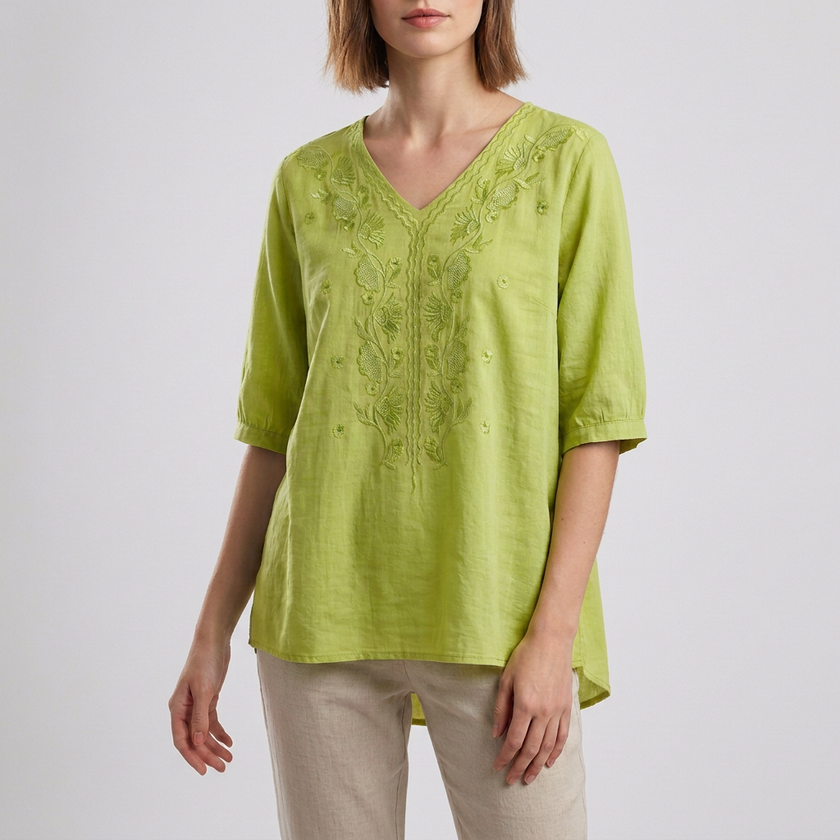 Yellow-green floral V-neck linen summer blouse for women by FJØRNA, featuring a stylish slit and lightweight fabric.