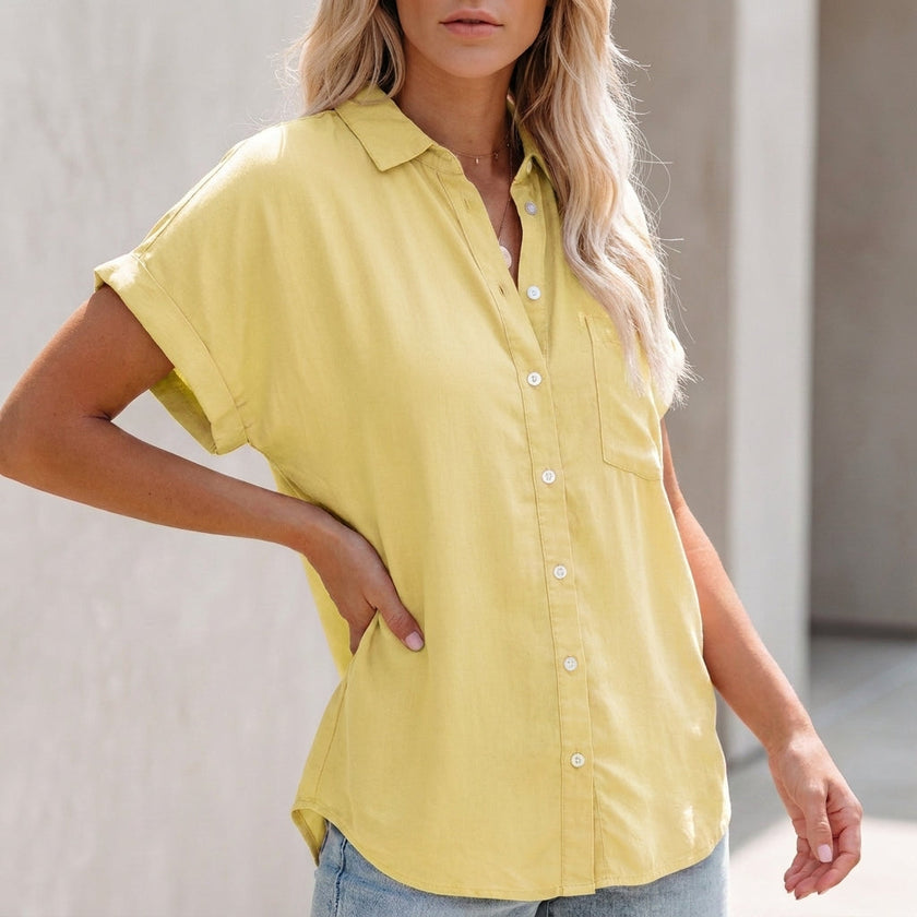 Yellow FJØRNA women's collared button-up blouse with cuffed sleeves and chest pocket, casual top for women.