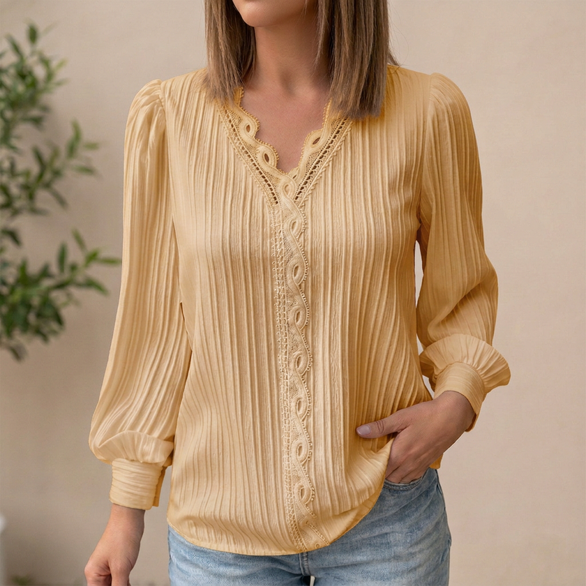 Yellow FJØRNA women's pullover blouse with V-neck, lace trim, pintuck texture, and long sleeves.