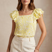 Yellow floral summer blouse for women with a square neckline by FJØRNA, showcasing lightweight, stylish women's top.