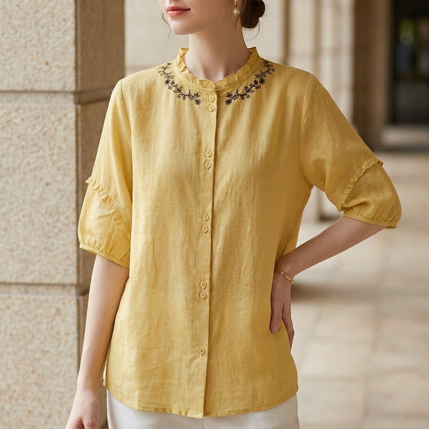 Yellow linen summer blouse for women with ruffle details, stylish FJØRNA top perfect for warm weather.