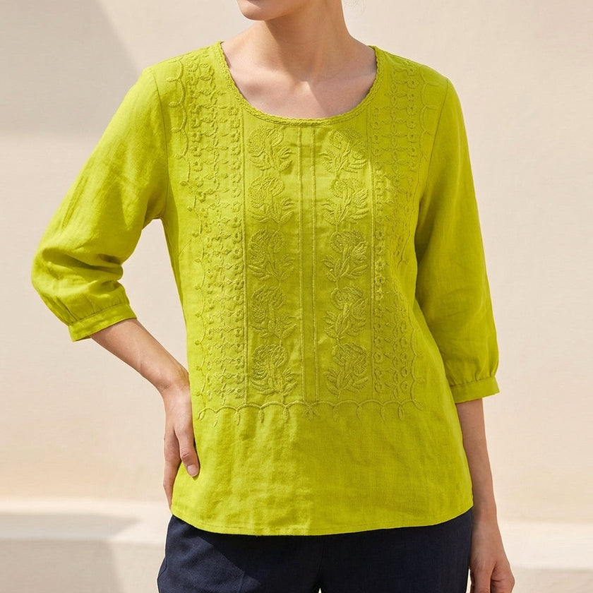 Yellow floral cotton summer blouse for women by FJØRNA, featuring a lightweight, breezy design perfect for warm weather.