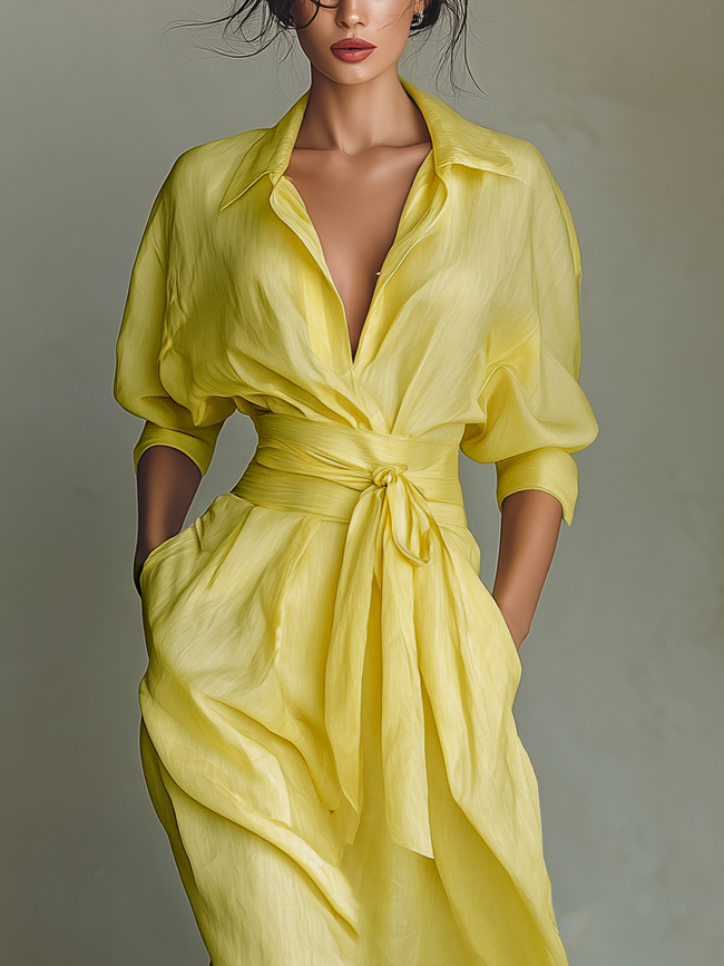 Yellow linen maxi dress for women by FJØRNA, flowing design with sleeveless style and lightweight fabric, ideal for summer wear.